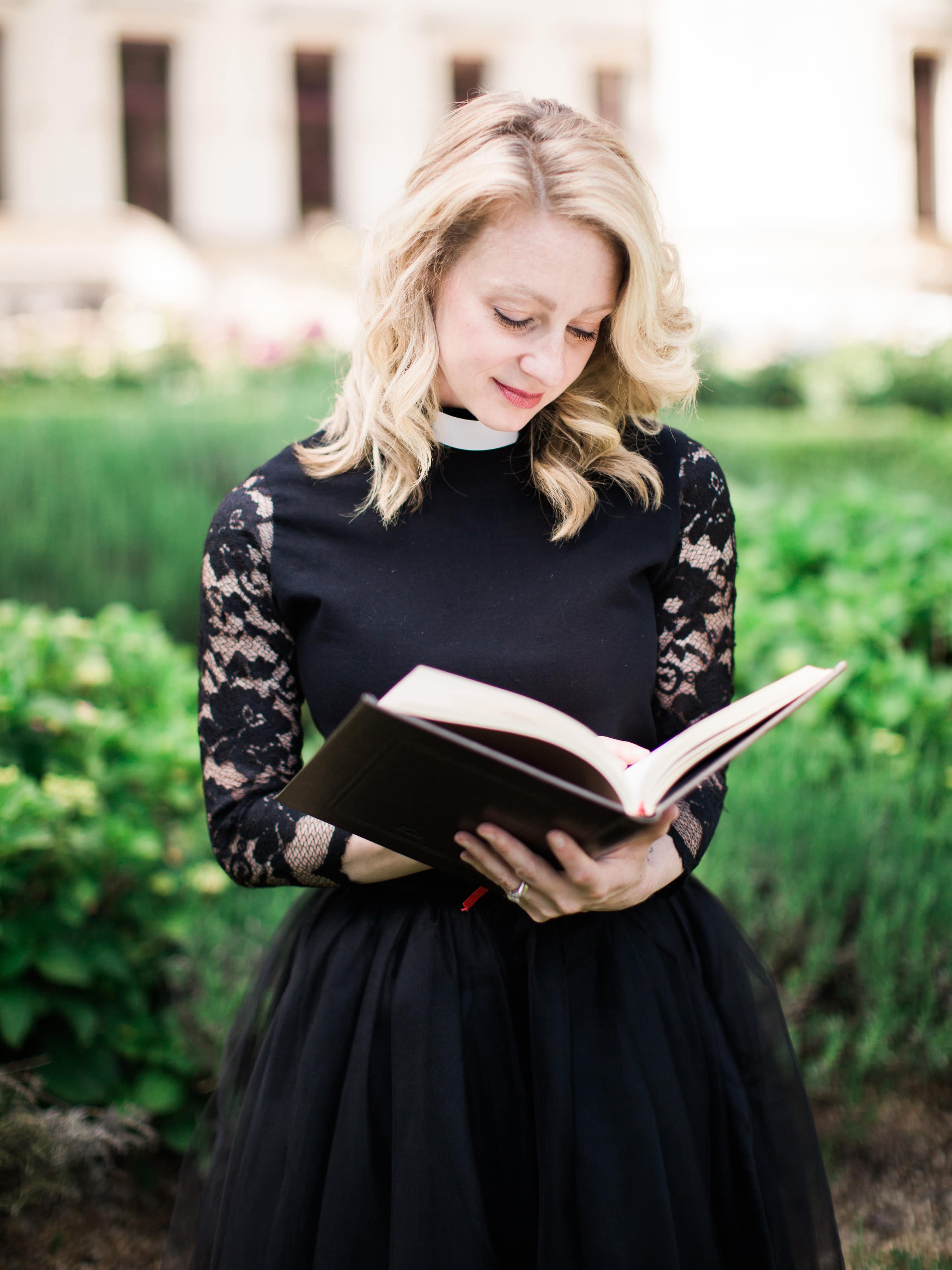 Rev. Michelle Wahila of Ruffled By Grace, reading